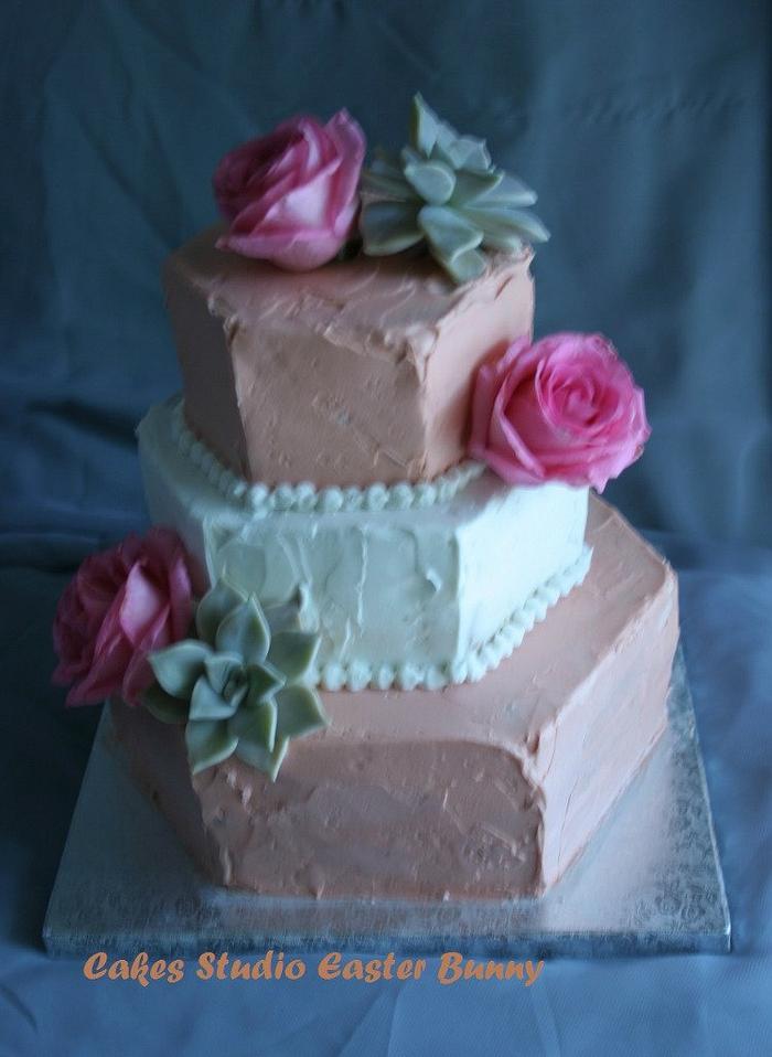 Roses and succulent wedding cake