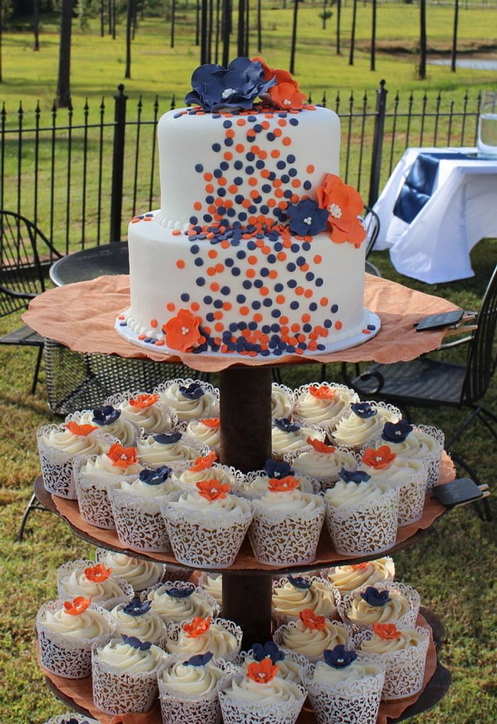 Orange and Navy Brides Cake with Cupcakes