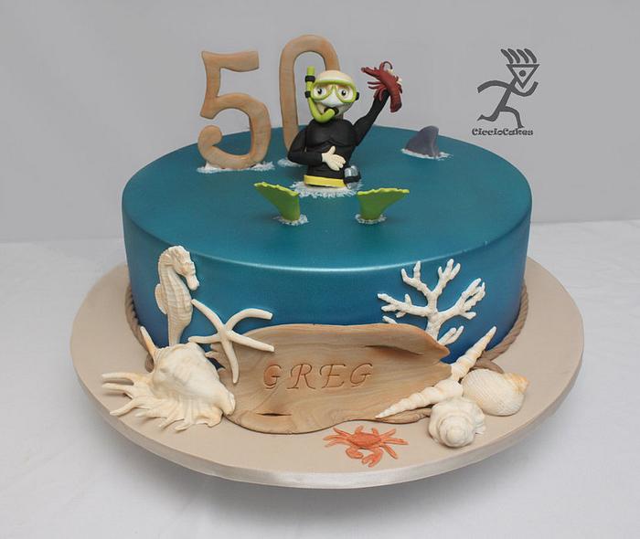 Diver Cake with edible figurine, shells, coral & diftwood