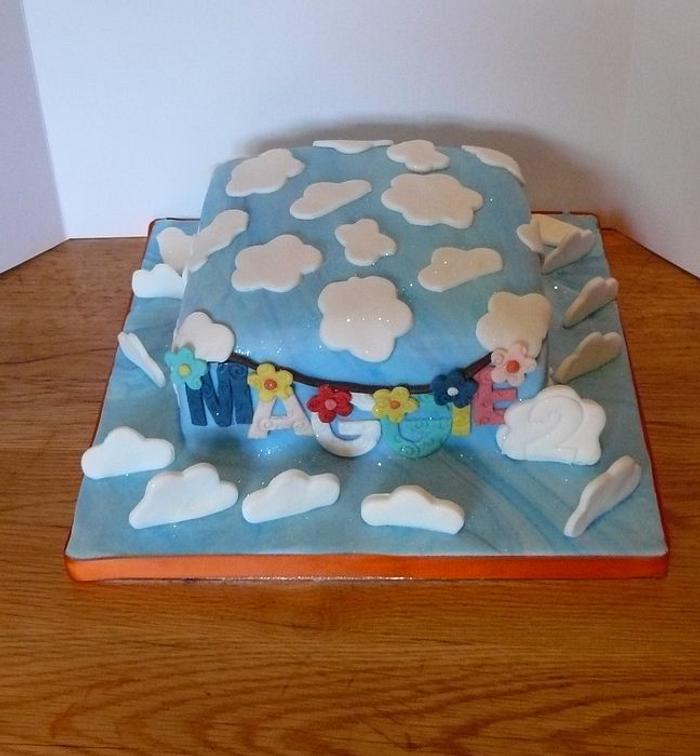 clouds and bunting cake 
