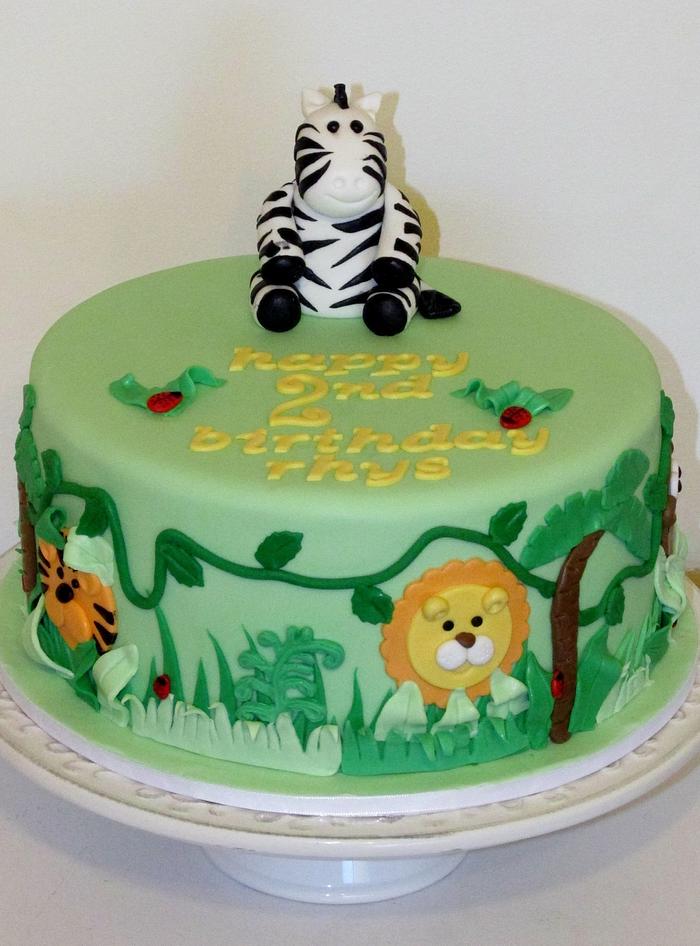 jungle themed cake for babies 2nd birthday