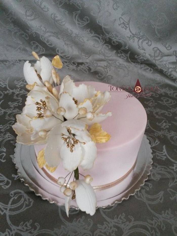 Elegant cake with sugar flower