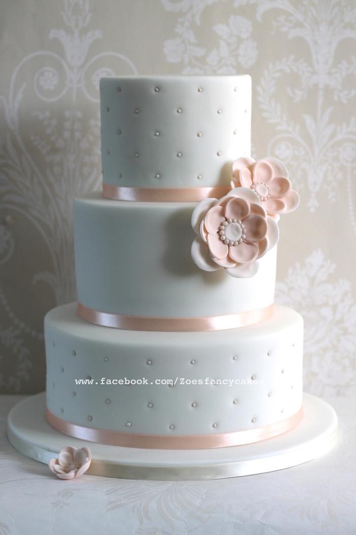 White and peach wedding cake