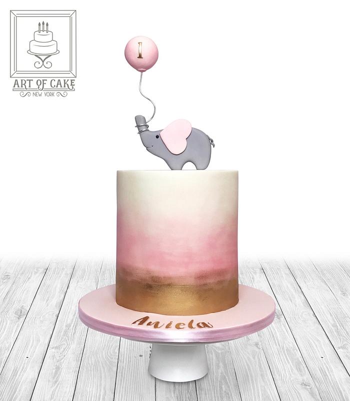 Simple and elegant elephant 1st birthday cake