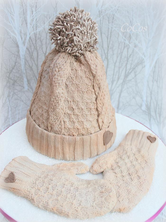 Winter wooly knitted bobble hat and mittens 