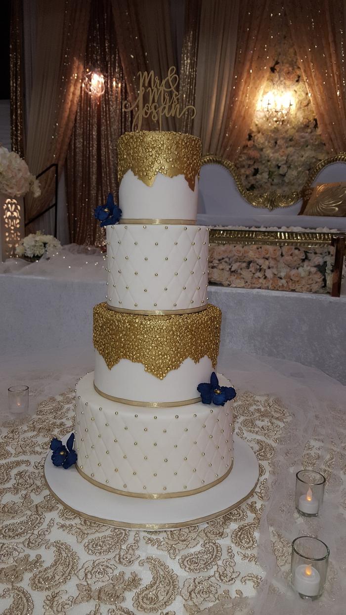 White and gold wedding cake