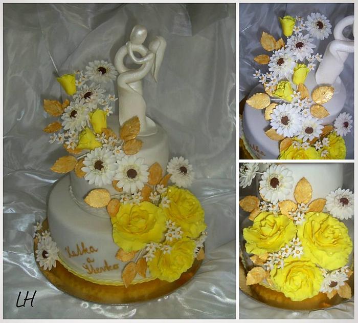 Wedding cake with yellow roses