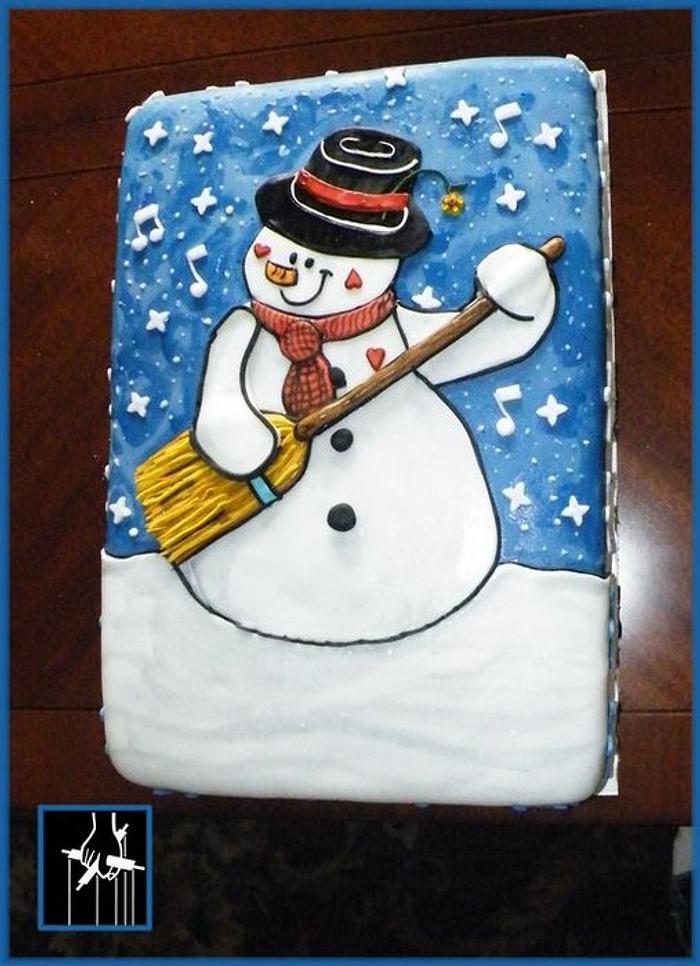 THE SNOWMAN PLAYING A BROOM STICK GUITAR CAKE