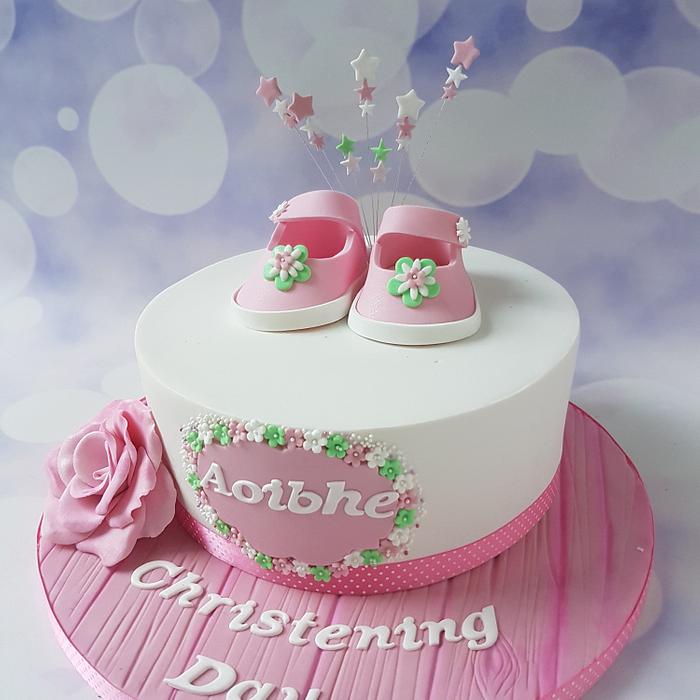 Booties christening cake