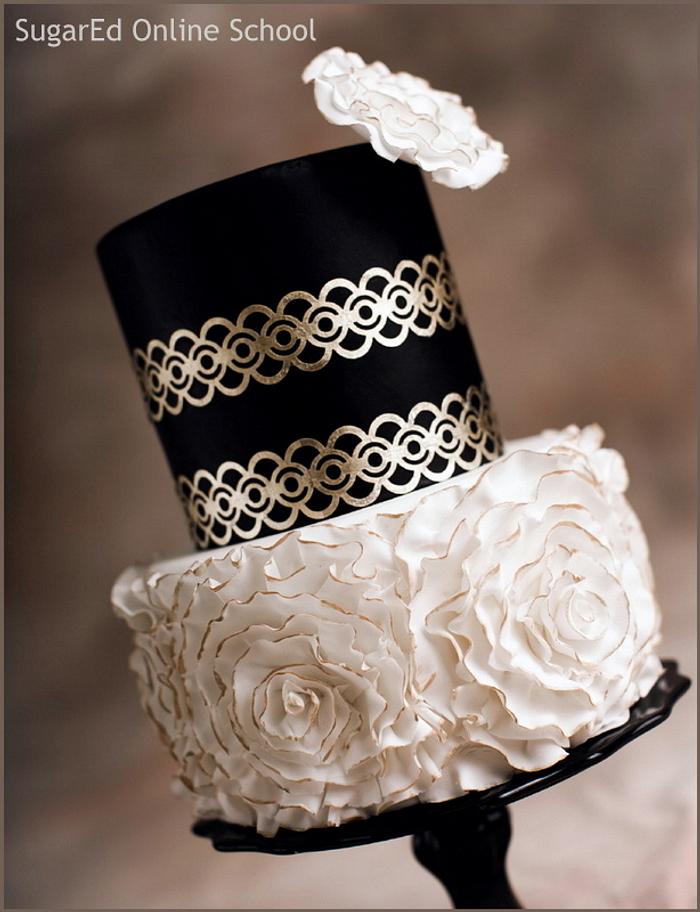 Gold leaf lace and fondant rosettes cake - Decorated Cake - CakesDecor