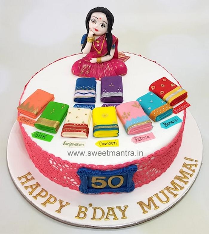 Customized cake with lady confused over lots of sarees for a mom's 50th birthday