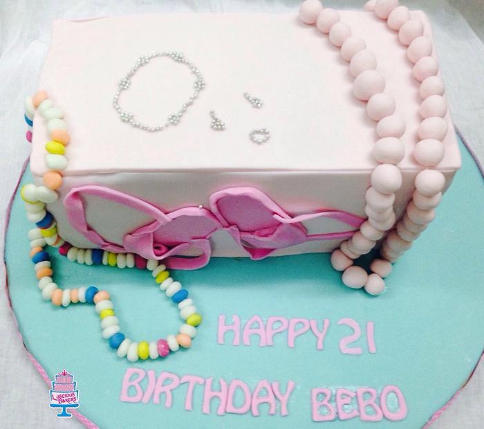 Beads and necklace themed cake