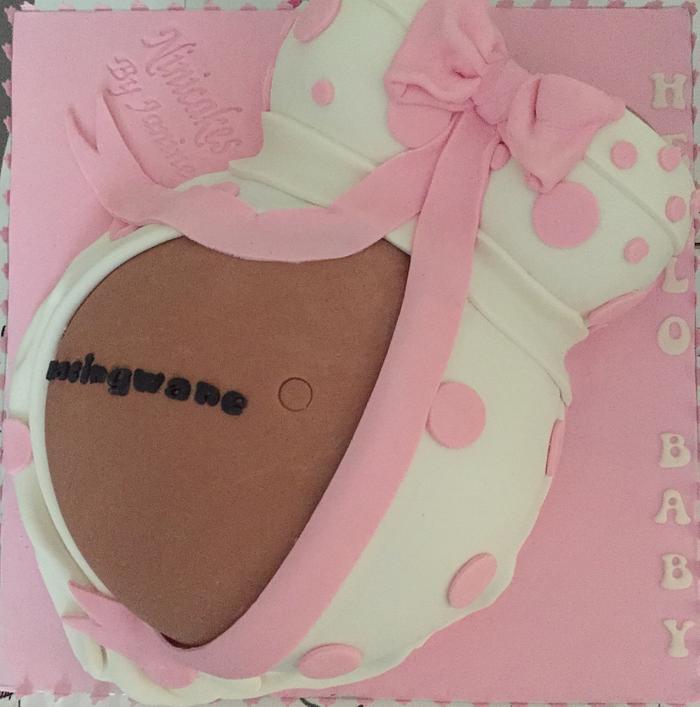 Baby bump cake for a girl