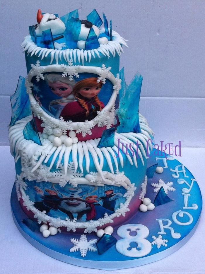 Olaf swimming on a FROZEN cake. 