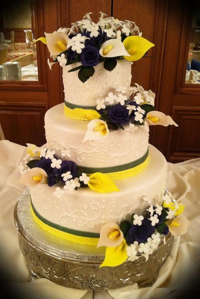 Green, yellow, blue wedding cake