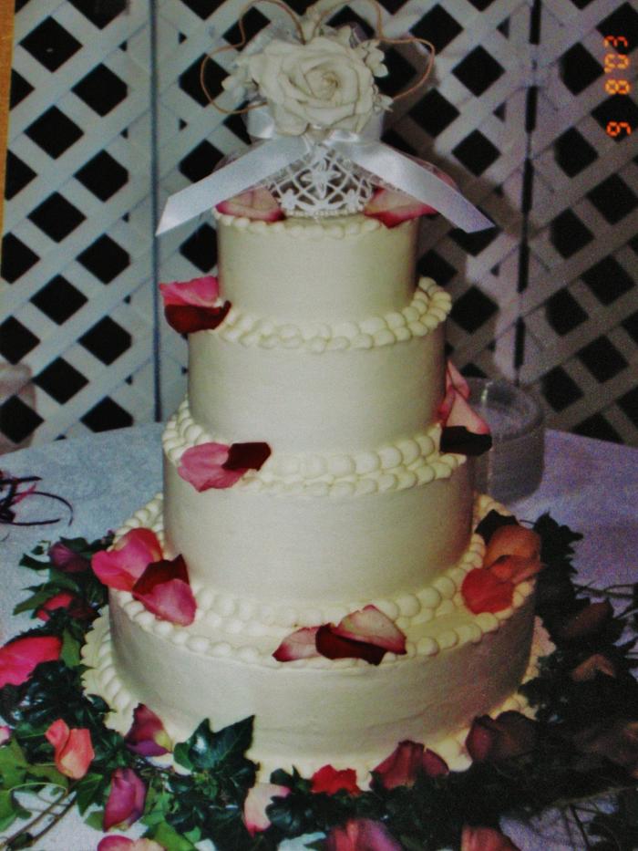 buttercream rose petal wedding cake