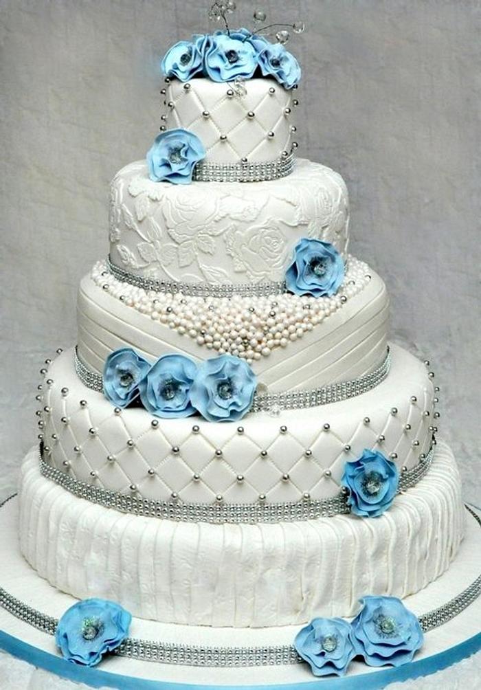 Pale blue and white wedding cake