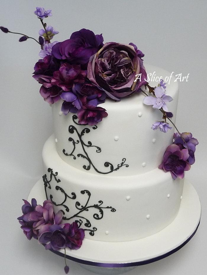 Black scroll wedding cake