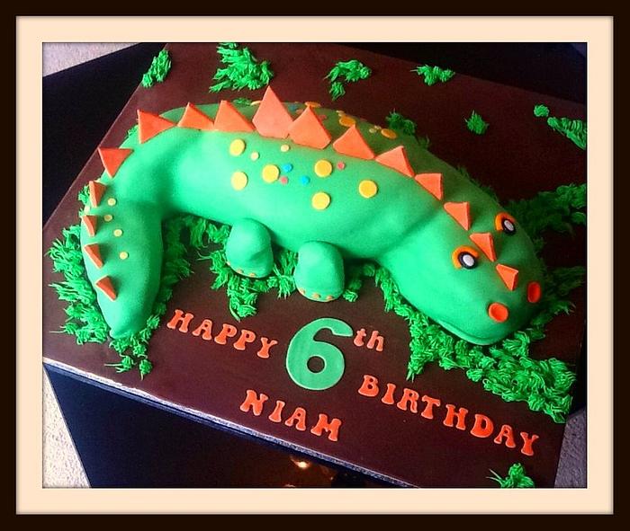 Green dinosaur cake
