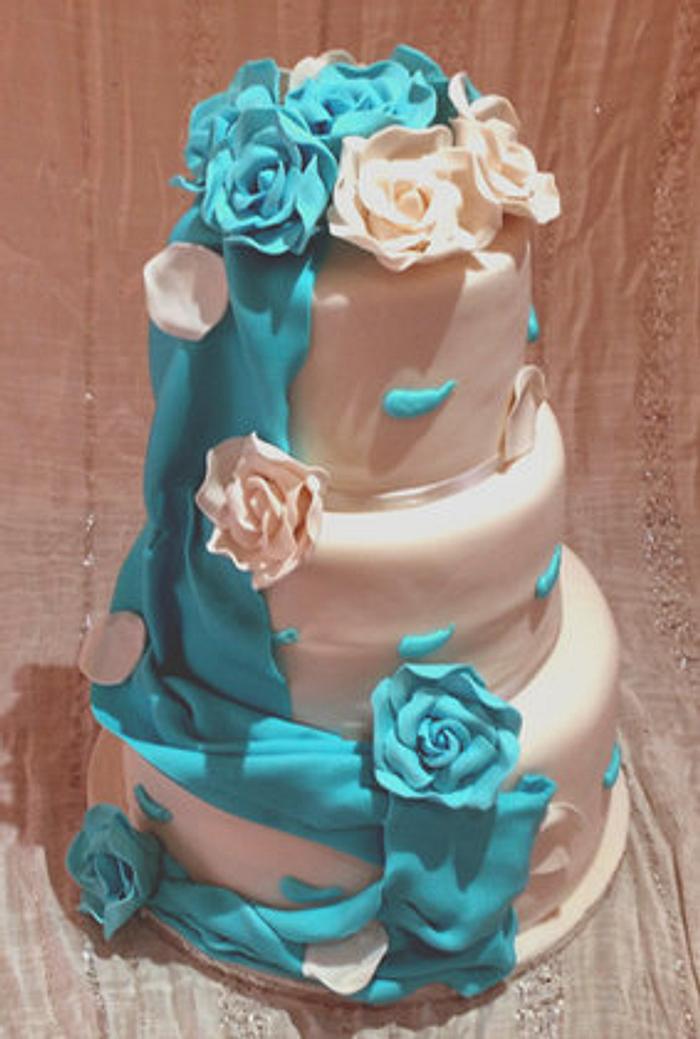 Draped blue and white wedding cake