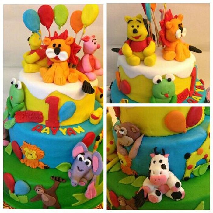pooh in d jungle first bday cake 