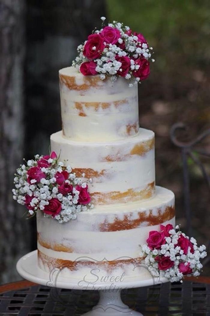Semi naked cake with fresh flowers