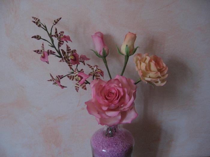 Roses and Lemboglossum orchid