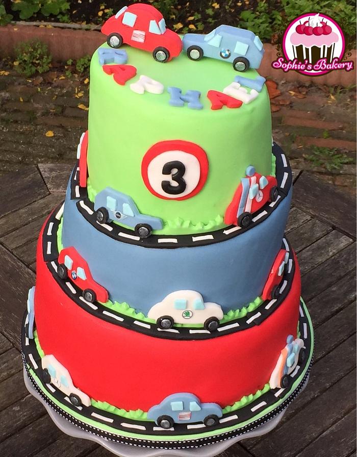 Topsy Turvy cars birthday cake with matching cupcakes