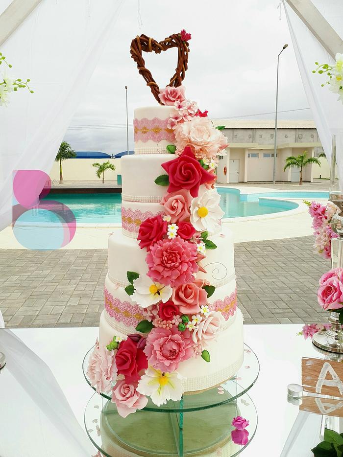 Cascading flower wedding cake