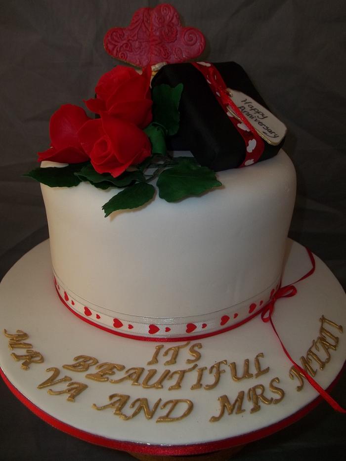 Anniversary cake with red roses