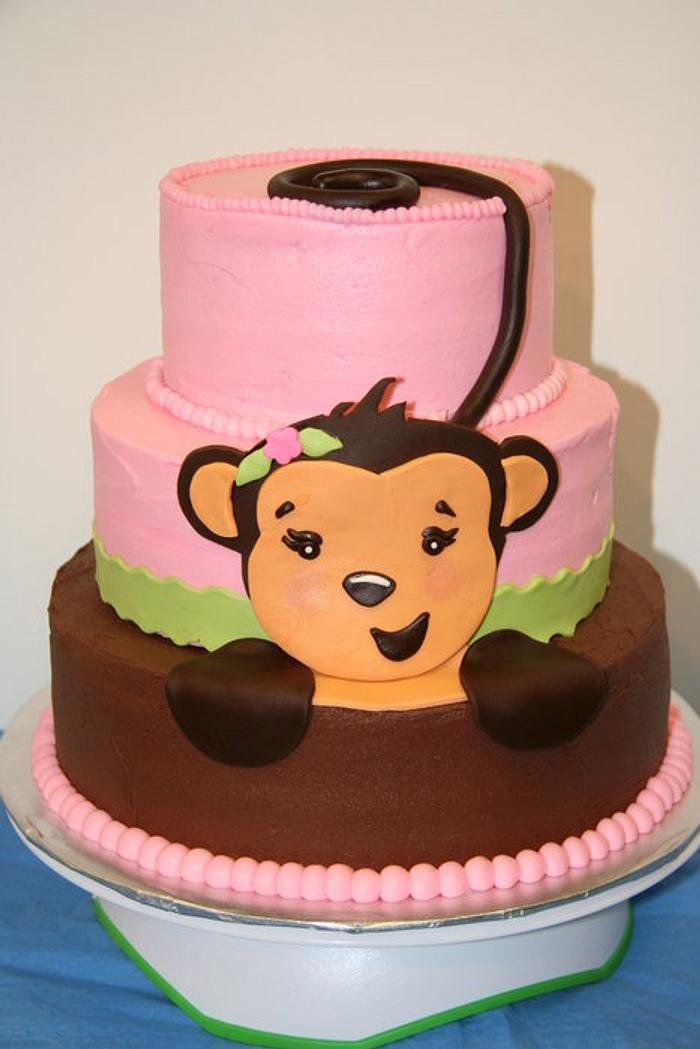 Girl monkey baby shower cake