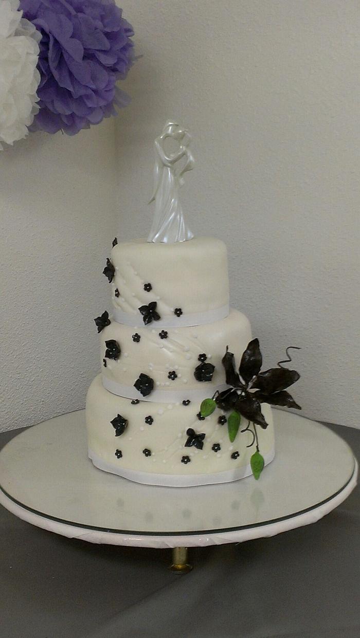 White and deep purple wedding cake.