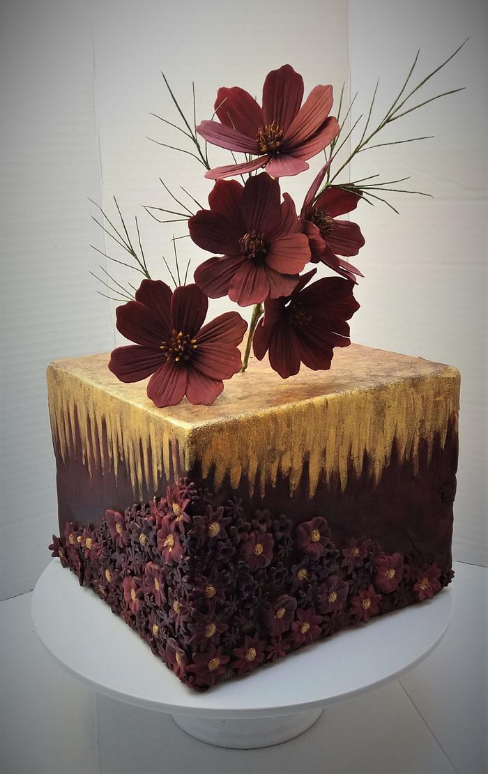 Cake with chocolate cosmos flowers