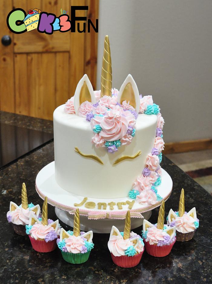 Unicorn cake with cupcakes