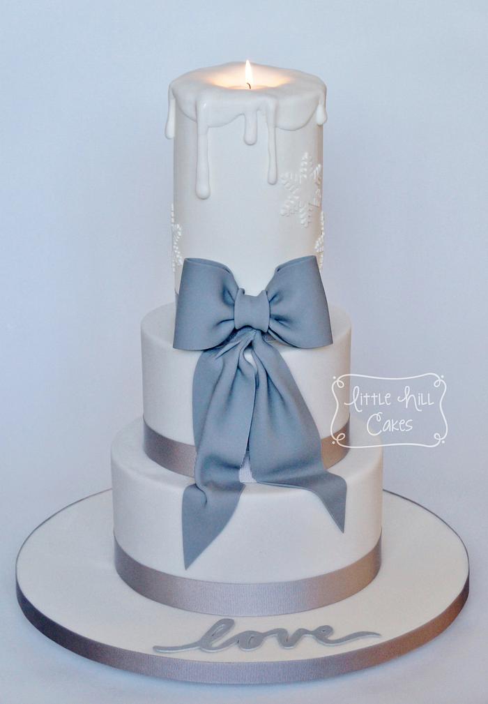 Candle & Bow Winter Wedding Cake