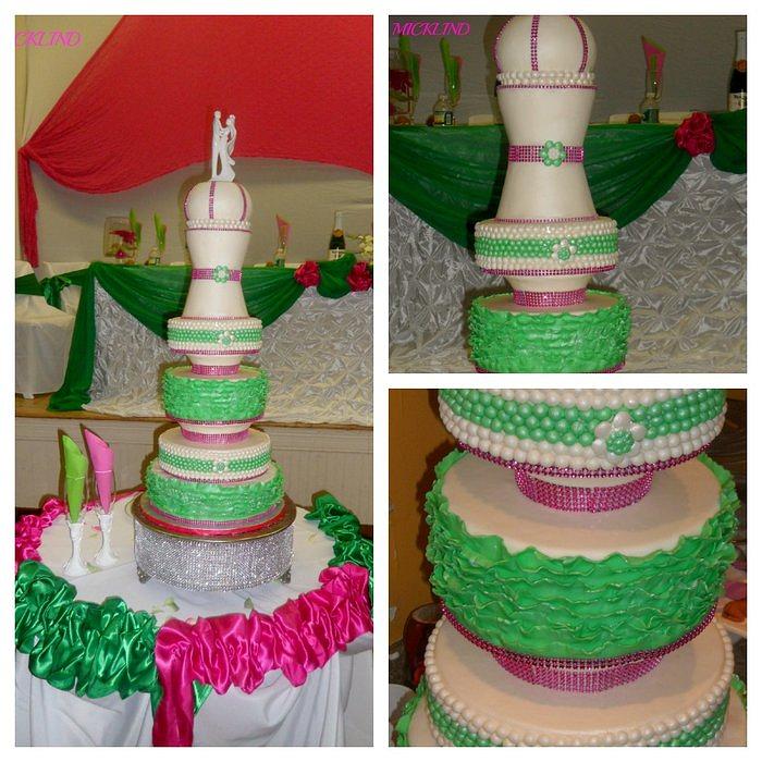 A 6TIER PEARLS & RUFFLES WEDDING CAKE