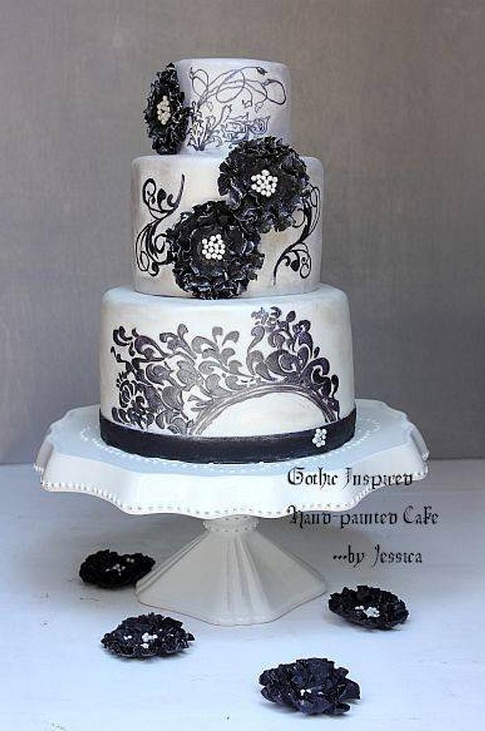 Black and white filigree painted cake