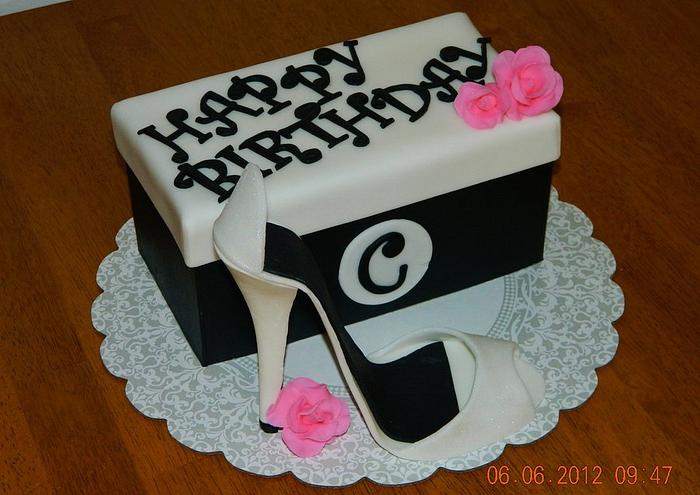 Shoe box cake w/gum paste shoe and flowers.