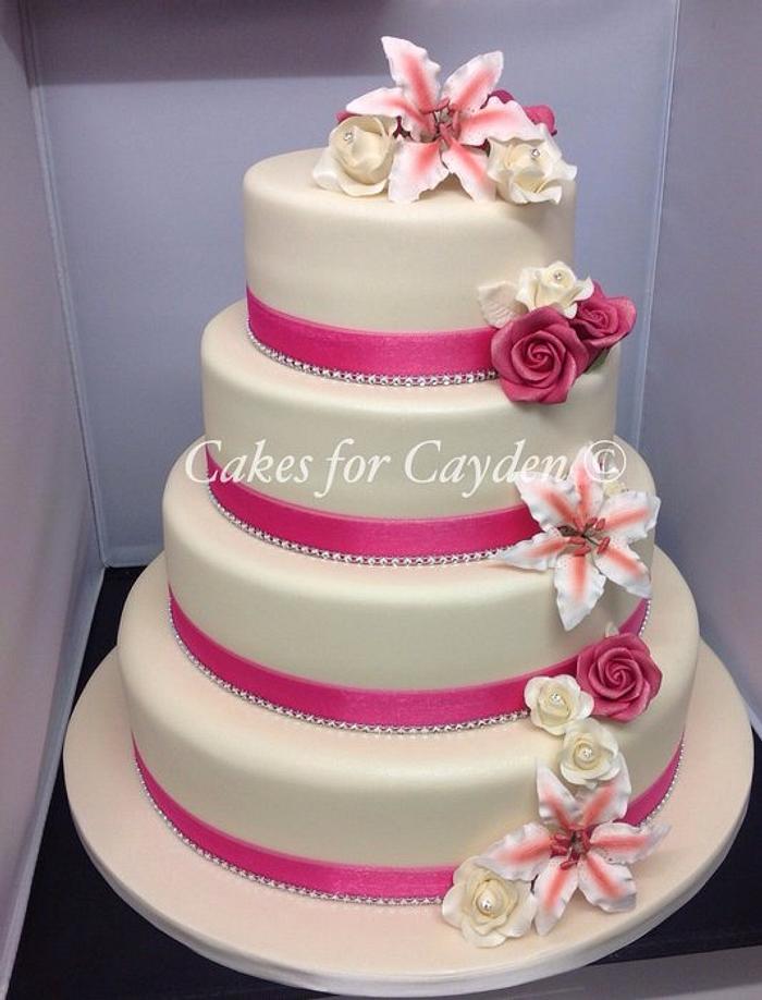 Stargazer Lillie's and Roses Wedding Cake 