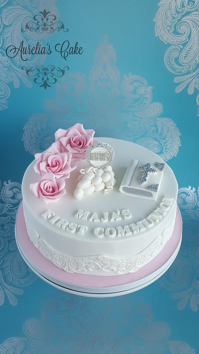 First comunnion cake in white and pink.