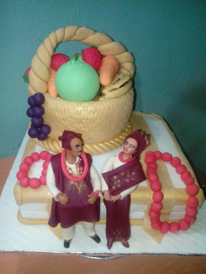 African bride and groom engagement cake