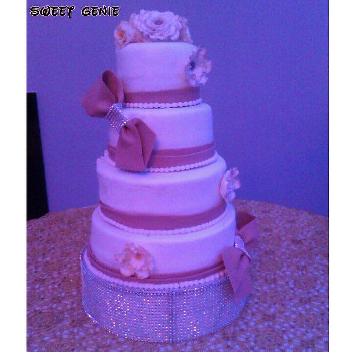 Four tier cake with bows