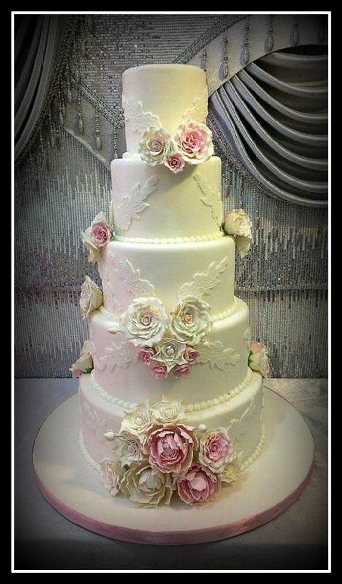 Wedding cake with peonies and roses