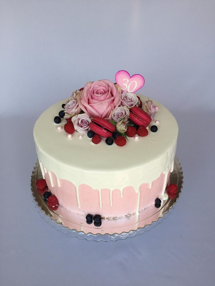 Drip cake with fresh roses