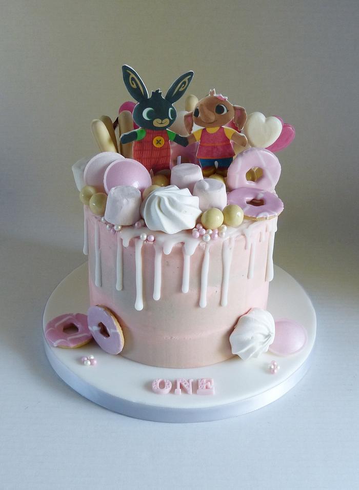 Pink and grey drip cake with Bing and Sula
