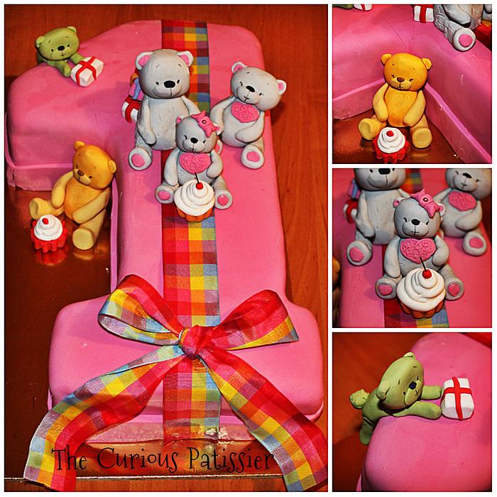 Number 1 shaped birthday cake with teddy bears 