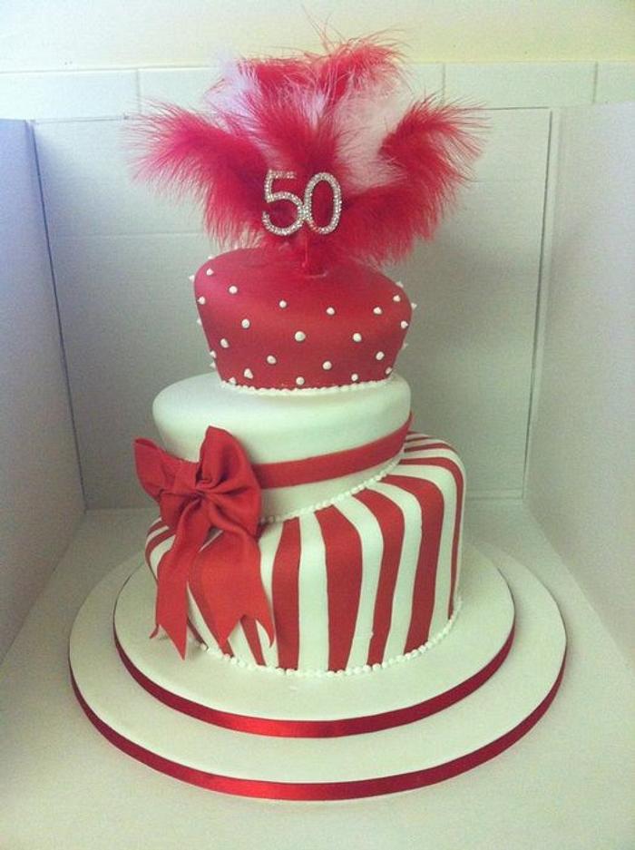 Red and white topsy turvy with feathers