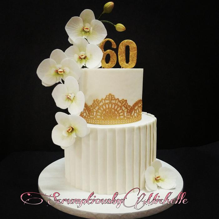 Cascading wafer paper Moth Orchid on white and gold themed cake