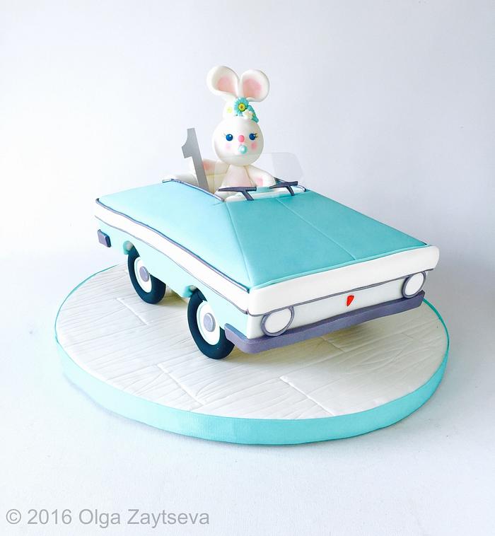 Toy car and a little bunny cake