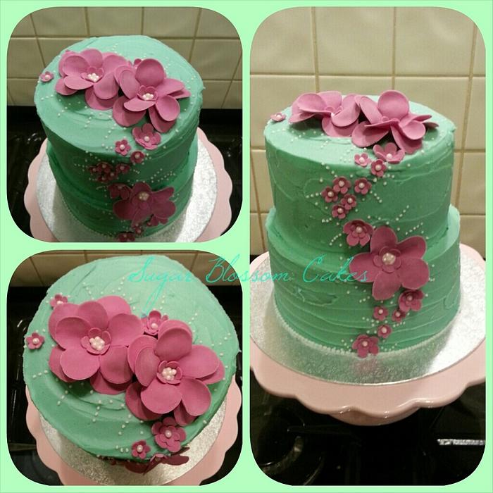 Teal and cerise birthday cake